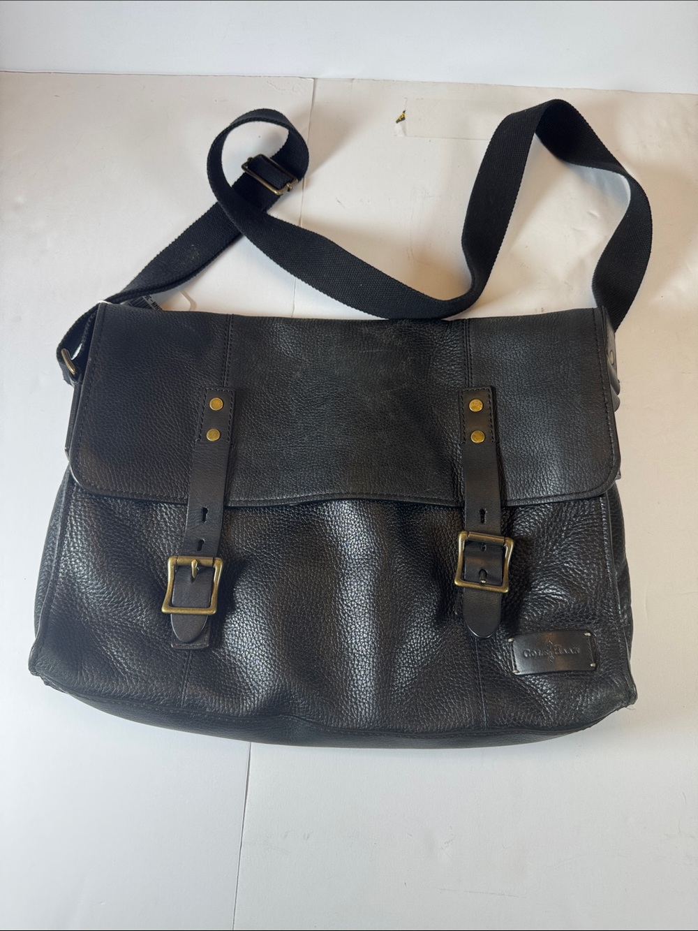 Cole Haan Black Leather Messenger Bag with Brass Accents